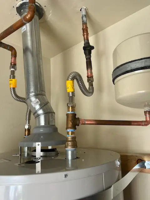 Water heater installation and plumbing repair in Mason